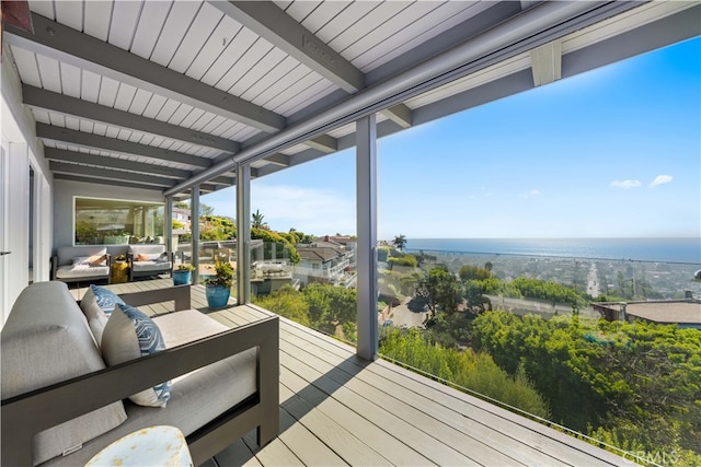 wooden deck featuring outdoor lounge area