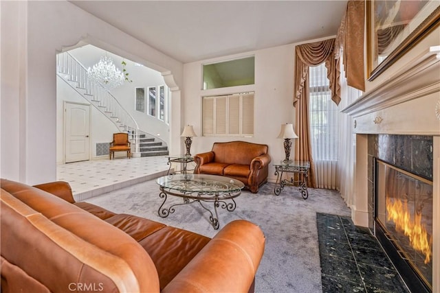 sitting room with carpet floors and a fireplace