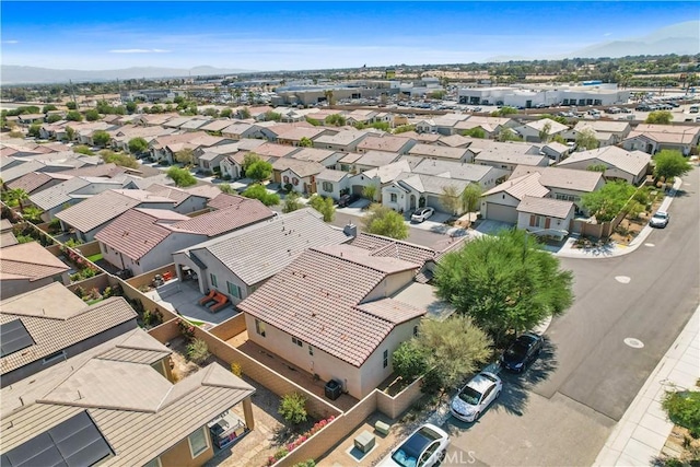 birds eye view of property featuring a mountain view