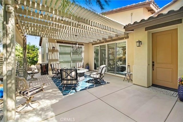 view of patio featuring a pergola