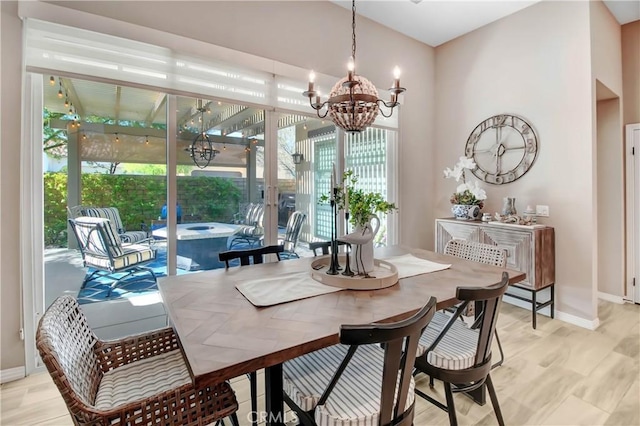 dining area with a notable chandelier