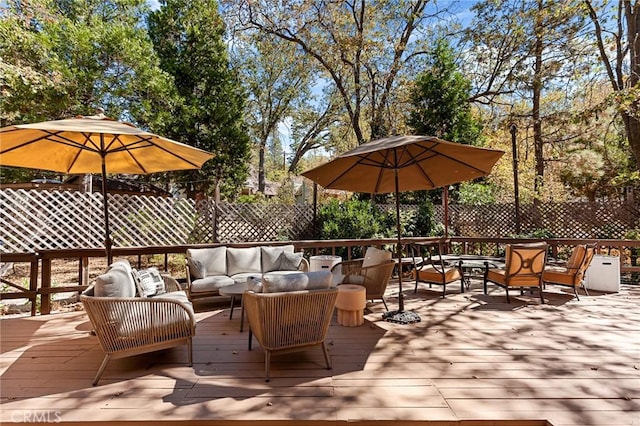 wooden deck featuring an outdoor living space