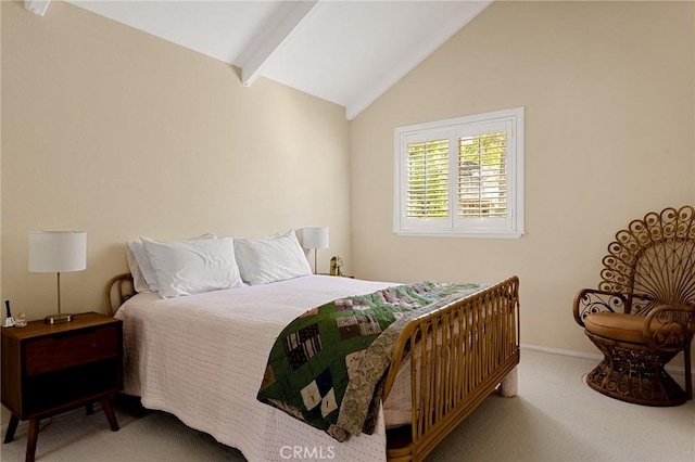 bedroom with light carpet and lofted ceiling with beams