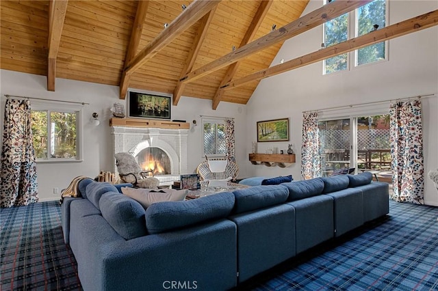 living room with a brick fireplace, beam ceiling, carpet flooring, high vaulted ceiling, and wooden ceiling