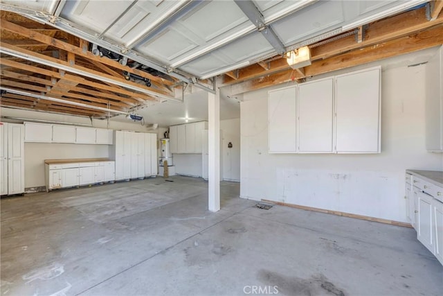 garage featuring gas water heater