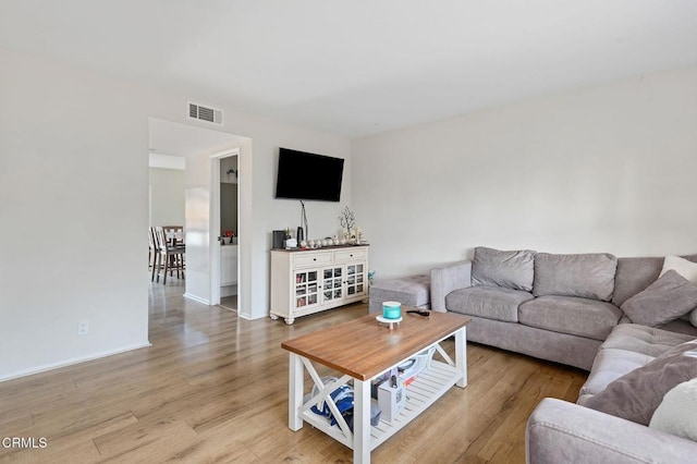 living room with light wood-type flooring