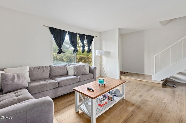 living room with light hardwood / wood-style floors