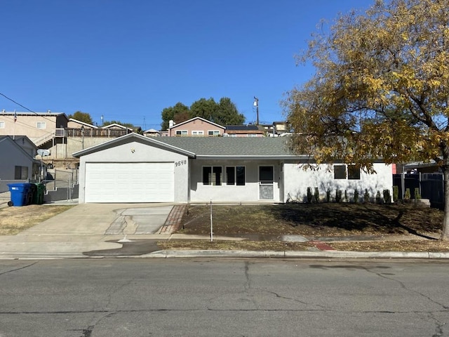 ranch-style home with a garage