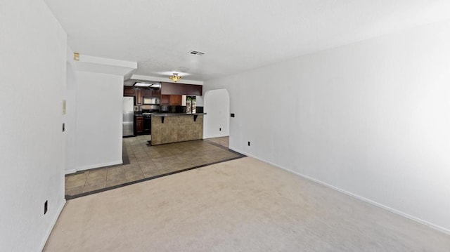 living room featuring light colored carpet