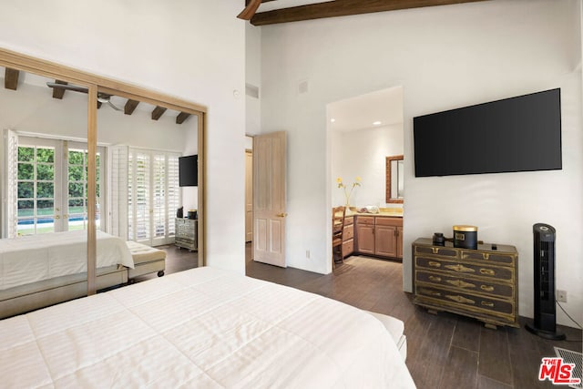 bedroom featuring french doors, dark hardwood / wood-style flooring, ensuite bathroom, high vaulted ceiling, and beamed ceiling