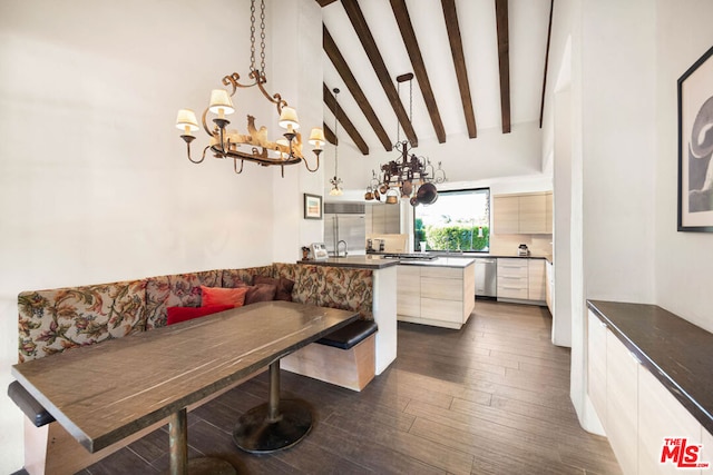 dining room with an inviting chandelier, dark hardwood / wood-style flooring, high vaulted ceiling, beamed ceiling, and breakfast area