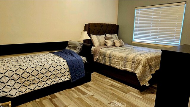 bedroom featuring hardwood / wood-style floors