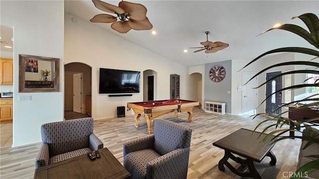 game room with high vaulted ceiling, billiards, and light hardwood / wood-style flooring