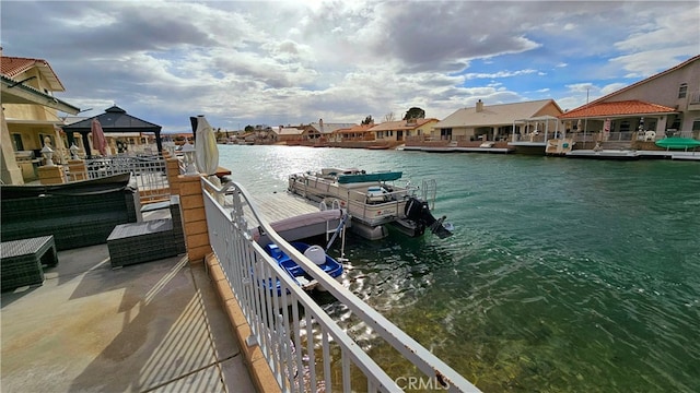 dock area featuring a water view