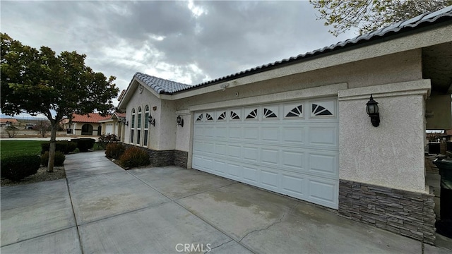 view of property exterior with a garage