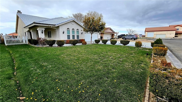 view of yard featuring a garage