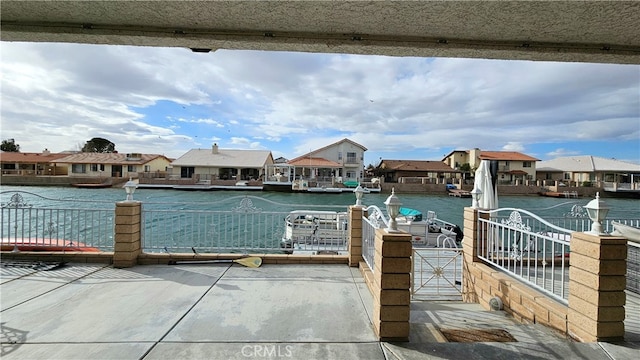 dock area featuring a water view