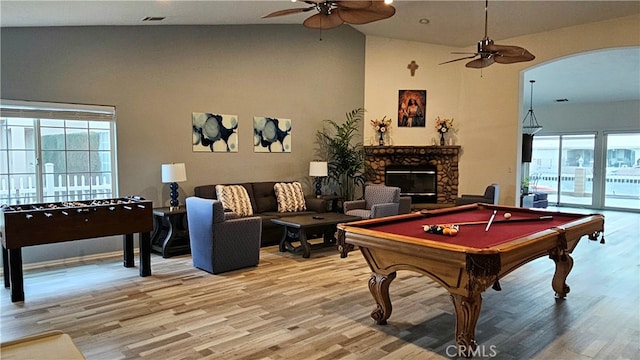 game room with pool table, high vaulted ceiling, light wood-type flooring, and ceiling fan