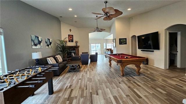 playroom with pool table, wood-type flooring, high vaulted ceiling, and ceiling fan