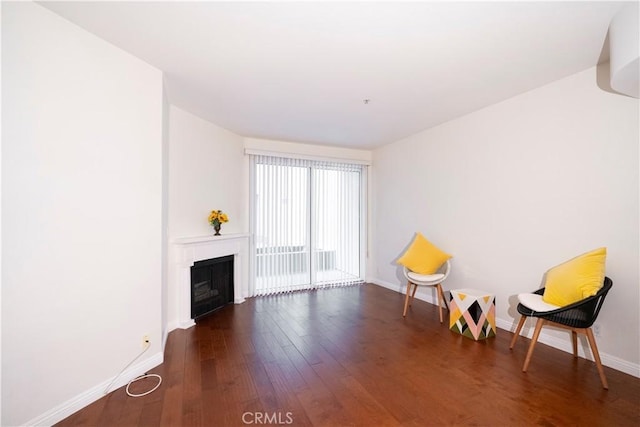 interior space with a raised ceiling and ornamental molding