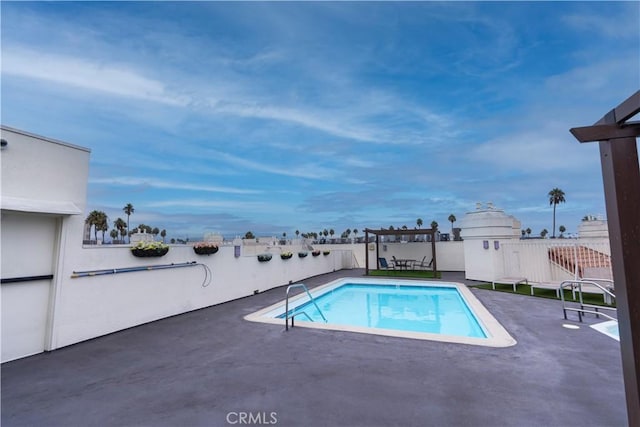 view of pool with a patio