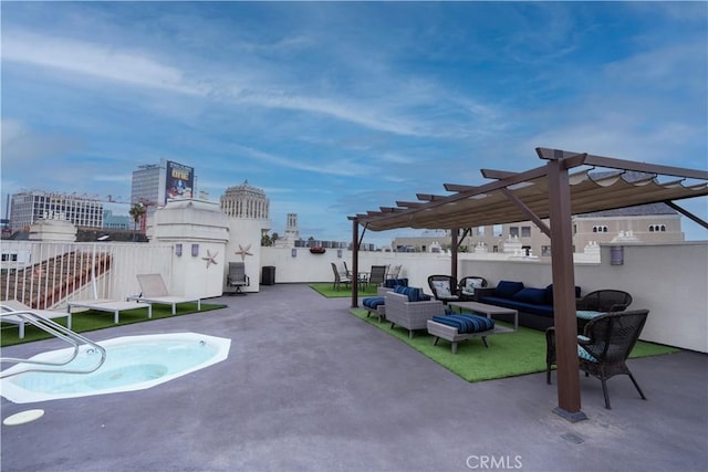 view of pool with outdoor lounge area, a patio area, and a pergola