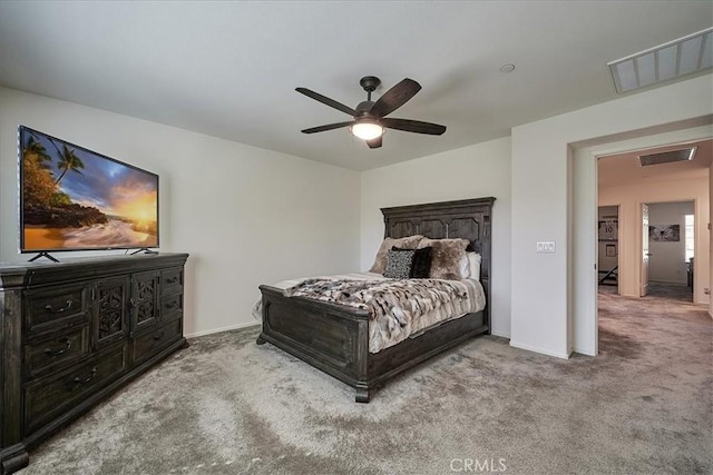 bedroom featuring ceiling fan and light colored carpet