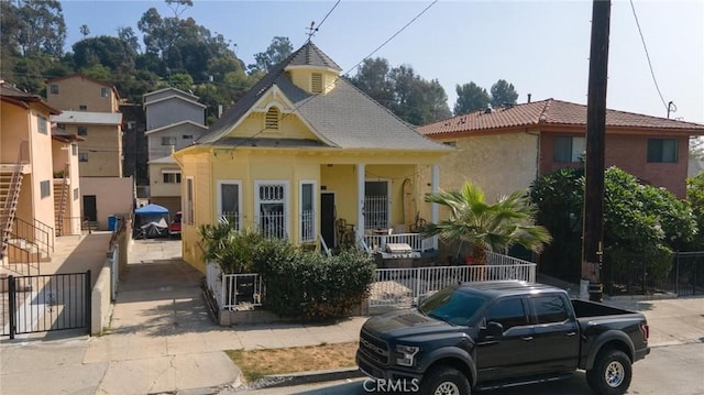 view of front of property featuring covered porch