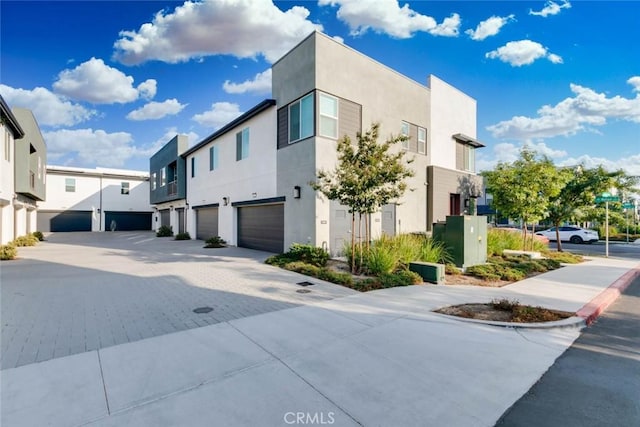 view of property exterior featuring a garage