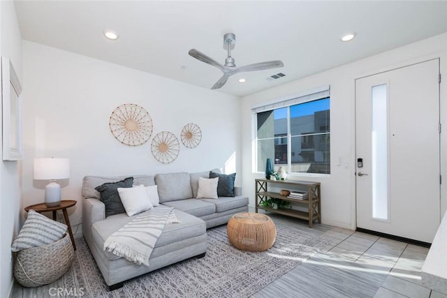 living room with ceiling fan