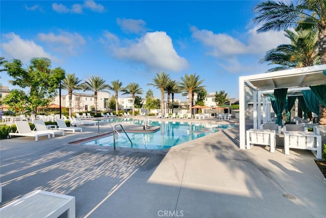 view of swimming pool featuring a patio