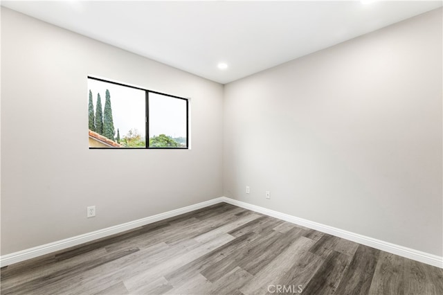 unfurnished room featuring light hardwood / wood-style floors