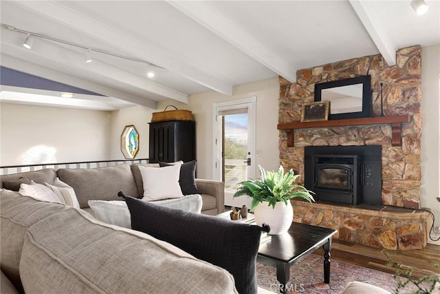 living room with beam ceiling and wood-type flooring