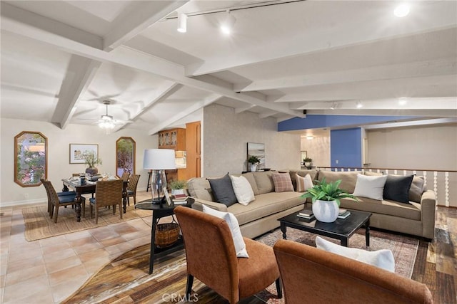 living room with ceiling fan, light tile patterned flooring, lofted ceiling with beams, and track lighting