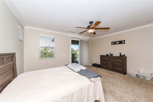 carpeted bedroom featuring access to outside, ornamental molding, and ceiling fan