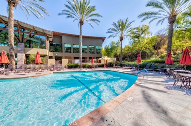 view of pool featuring a gazebo and a patio