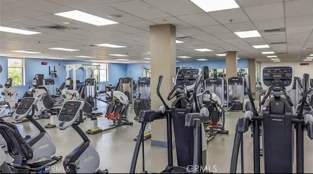 workout area featuring a drop ceiling