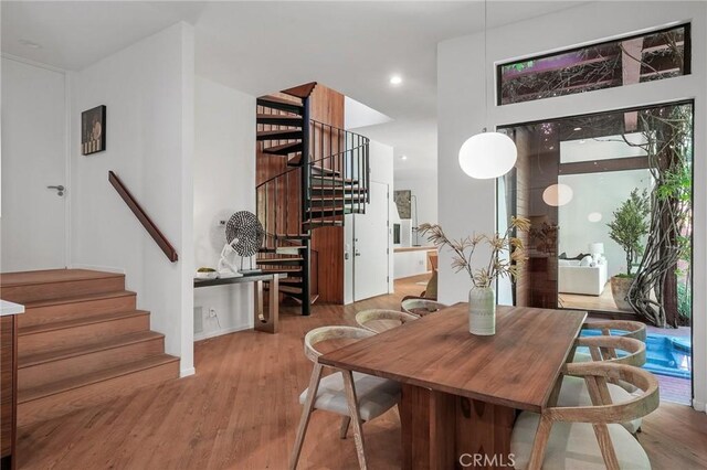 dining room with wood-type flooring