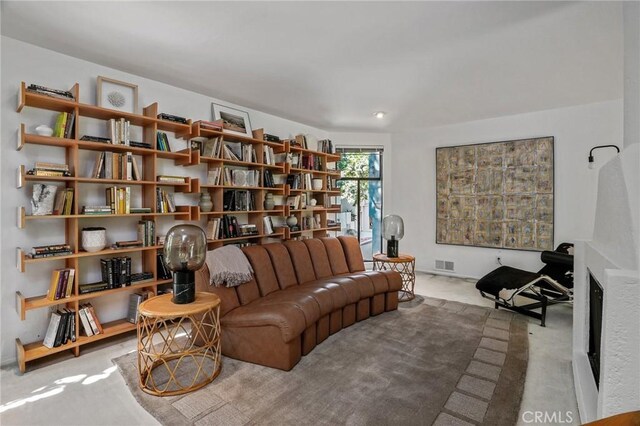 sitting room with light colored carpet