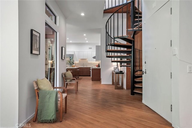 hallway featuring wood-type flooring