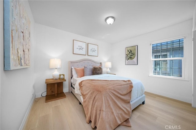 bedroom featuring light hardwood / wood-style flooring