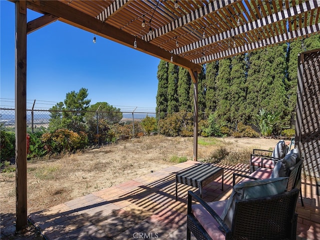 view of patio / terrace featuring a pergola