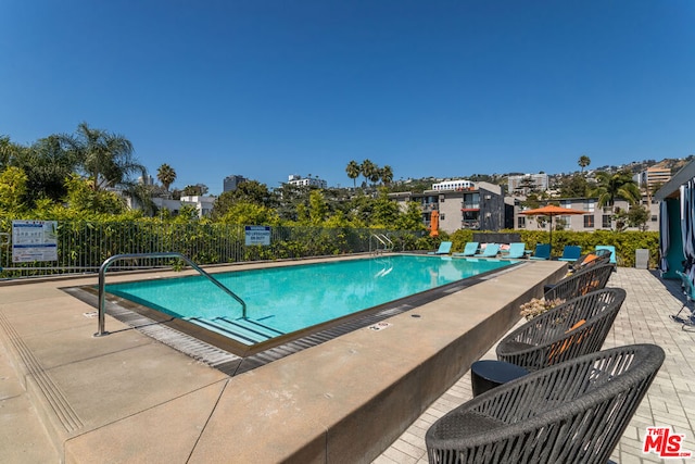 view of pool with a patio