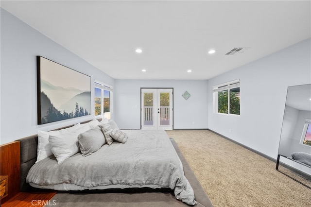 bedroom featuring carpet flooring, french doors, and access to outside