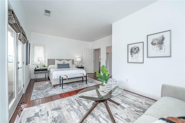 bedroom featuring dark wood-type flooring