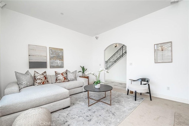 living room with light colored carpet