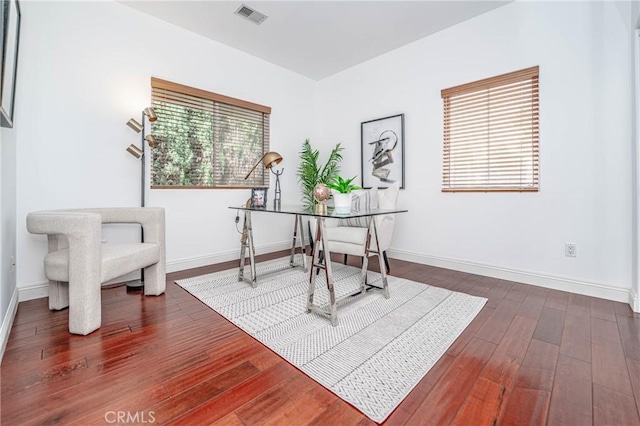 office space featuring dark hardwood / wood-style flooring