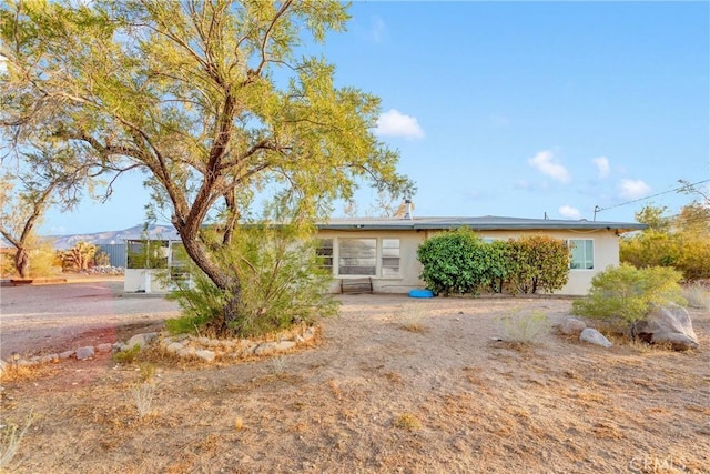 single story home with a mountain view