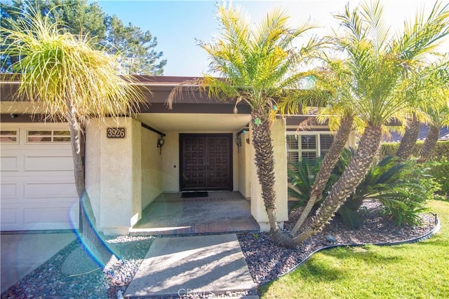 entrance to property featuring a garage