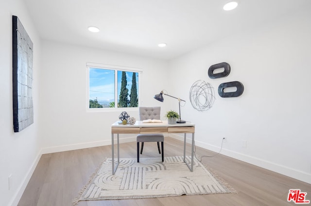 office space featuring light hardwood / wood-style flooring